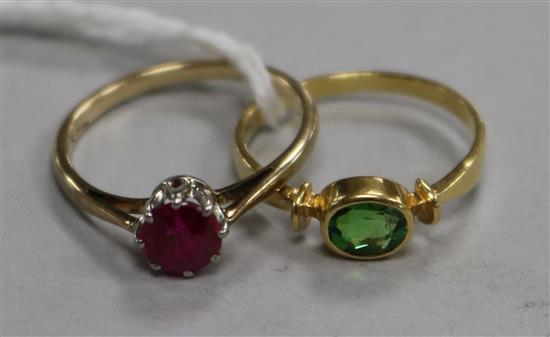 Two gem set rings, one 18ct and one 9ct gold and silver.